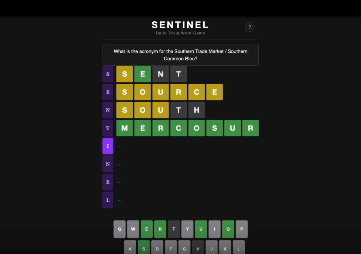 Early version: green and yellow tiles, bold sans SENTINEL wordmark, plain clue box